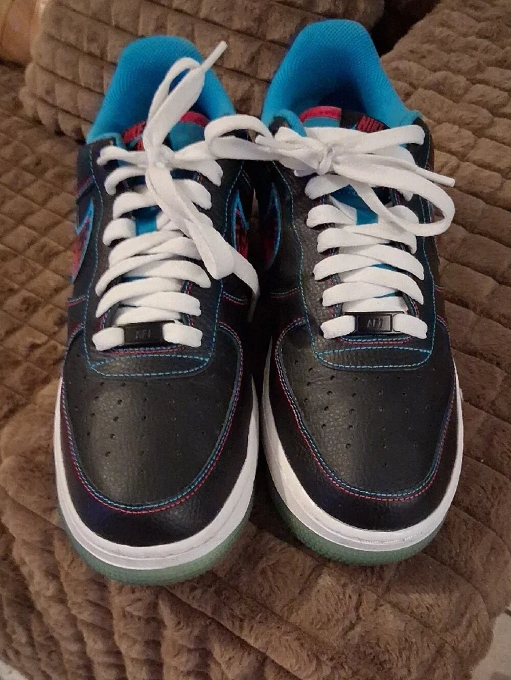 Nike Black Sneakers with Blue Lining and Red Patterned Swoosh
